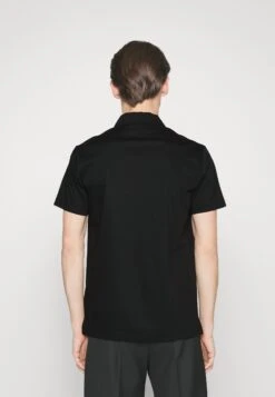 Tiger Of Sweden Laron - Poloshirt - Black -Even&Odd 05eaf99dba8e4909bb9bd3a6affd522c